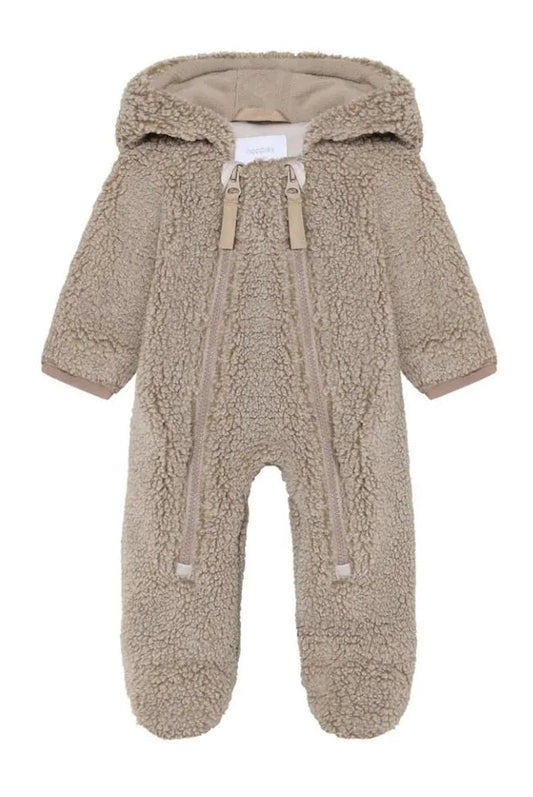 A baby's full-body fleece footed onesie in a warm taupe-beige color, featuring a hood with drawstrings and front zipper closures, shown against a plain white background.