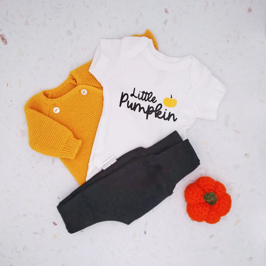 White "Little Pumpkin" Halloween premature baby bodysuit, close-up detail