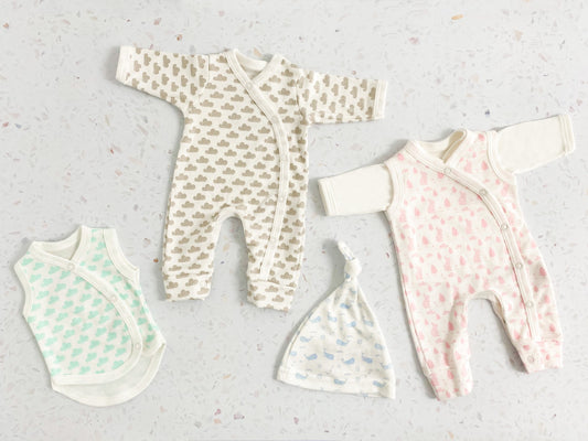 Tiny baby and first size baby clothes