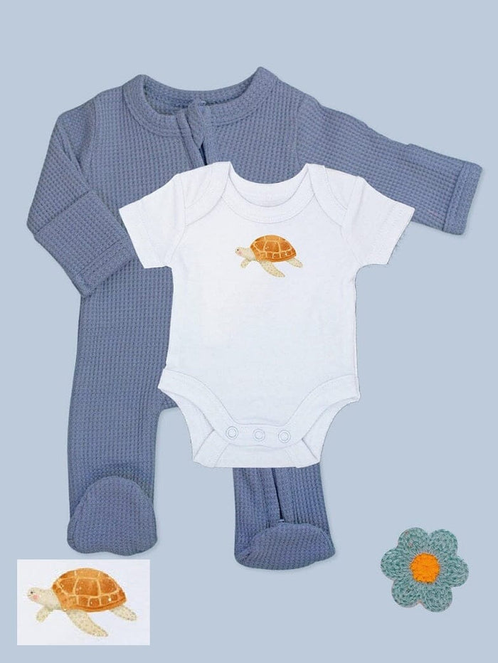 Blue zipped Sleepsuit & Turtle Motif Bodysuit Set.