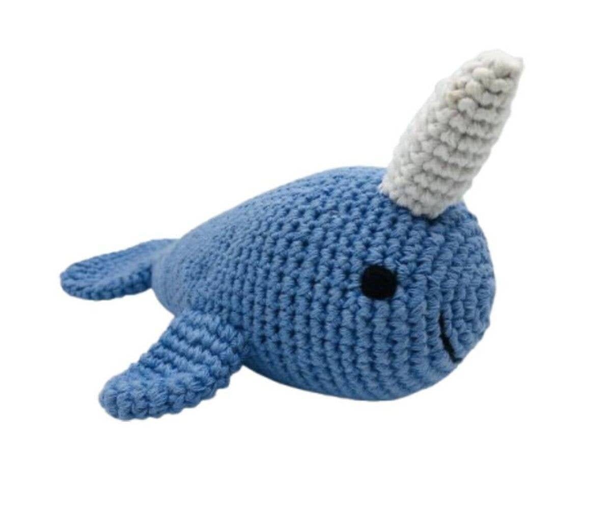 A blue crocheted narwhal plush toy with a white horn and a small black eye, shown on a plain white background. Perfect for a premature baby gift 